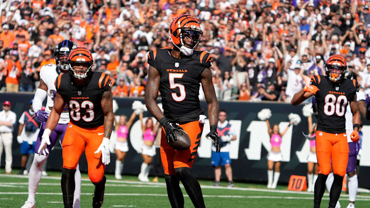 Cincinnati Bengals wide receiver Tee Higgins (5) makes a touchdown over the Baltimore Ravens in the 3rd quarter Sunday October 6, 2024 at Payor Stadium. The Bengals lost 41-38 in overtime.