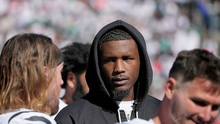 Cincinnati Bengals wide receiver Tee Higgins (5) talks with his teammates as the Bengals face the Philadelphia Eagles during the NFL Week 8 matchup at Paycor Stadium Sunday October 27, 2024. Higgins missed the game due to an injury.