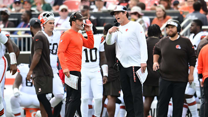 Aug 10, 2024; Cleveland, Ohio, USA; Cleveland Browns head coach Kevin Stefanski talks with offensive coordinator Ken Dorsey during the game against the Green Bay Packers at Cleveland Browns Stadium. Mandatory Credit: Ken Blaze-Imagn Images