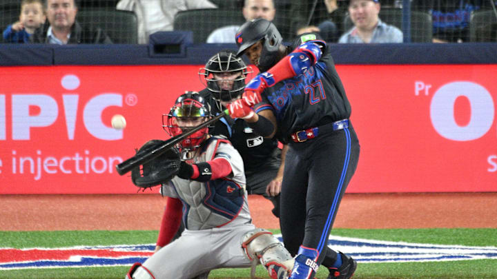 Sep 25, 2024; Toronto, Ontario, CAN; Toronto Blue Jays first baseman Vladimir Guerrero Jr. (27) hits a double against the Boston Red Sox in the fourth inning at Rogers Centre. Sep 25, 2024; Toronto, Ontario, CAN; Toronto Blue Jays first baseman Vladimir Guerrero Jr. (27) hits a double against the Boston Red Sox in the fourth inning at Rogers Centre.