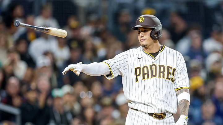 May 2, 2026; San Diego, California, USA; San Diego Padres third baseman Manny Machado (13) throws his bat after drawing a walk during the ninth inning against the Chicago White Sox at Petco Park. Mandatory Credit: David Frerker-Imagn Images