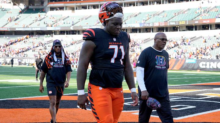 Cincinnati Bengals offensive tackle Amarius Mims (71) walks off the field after a loss to the Baltimore Ravens Sunday October 6, 2024 at Payor Stadium. The Bengals lost 41-38 in overtime. Cincinnati Bengals offensive tackle Amarius Mims (71) walks off the field after a loss to the Baltimore Ravens Sunday October 6, 2024 at Payor Stadium. The Bengals lost 41-38 in overtime.