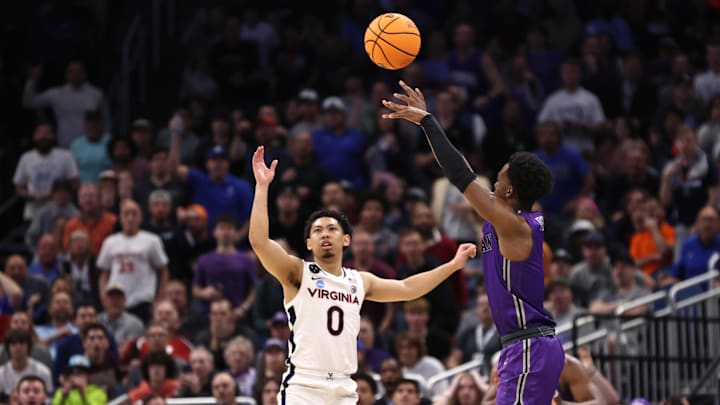 Mar 16, 2023; Orlando, FL, USA; Furman Paladins guard JP Pegues (1) shoots a three-point basket