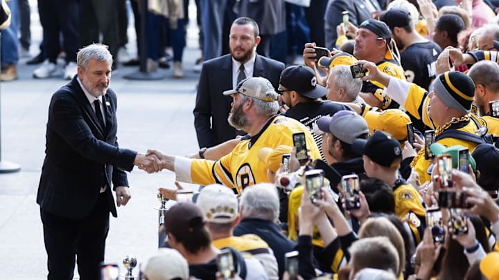 Oct 11, 2023; Boston, Massachusetts, USA; Boston Bruins President and Hockey Hall of Famer Cam Neely greets fans before the game between the Boston Bruins and the Chicago Blackhawks at TD Garden, the start of the Bruins 100th season in the NHL. Mandatory Credit: Winslow Townson-Imagn Images