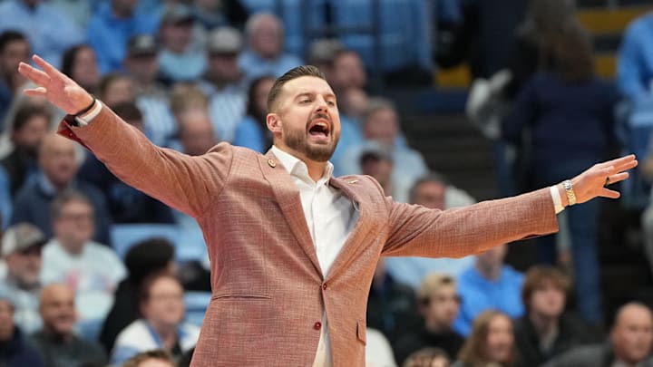 Dec 30, 2025; Chapel Hill, North Carolina, USA; Florida State Seminoles head coach Luke Loucks reacts in the first half at Dean E. Smith Center. Mandatory Credit: Bob Donnan-Imagn Images Dec 30, 2025; Chapel Hill, North Carolina, USA; Florida State Seminoles head coach Luke Loucks reacts in the first half at Dean E. Smith Center. Mandatory Credit: Bob Donnan-Imagn Images