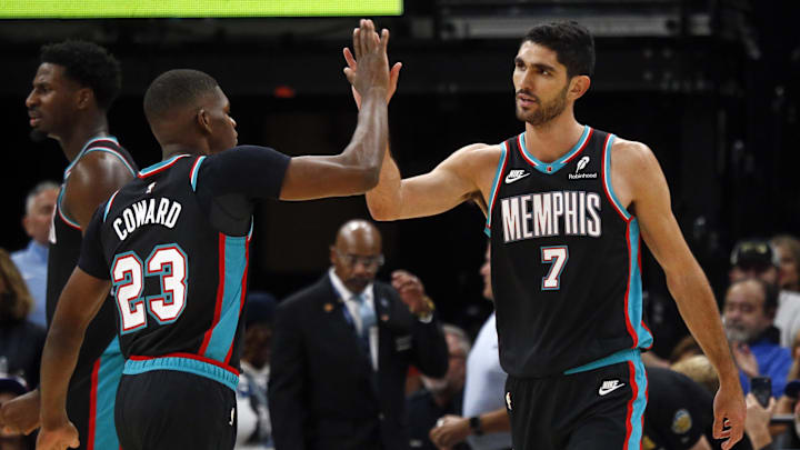 Oct 22, 2025; Memphis, Tennessee, USA; Memphis Grizzlies forward Santi Aldama (7) reacts with forward Cedric Coward (23) during the third quarter against the New Orleans Pelicans at FedExForum. Mandatory Credit: Petre Thomas-Imagn Images
