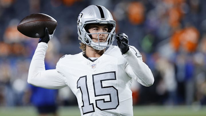 Nov 6, 2025; Denver, Colorado, USA; Las Vegas Raiders quarterback Kenny Pickett (15) practices before the game at Empower Field at Mile High. Mandatory Credit: Isaiah J. Downing-Imagn Images
