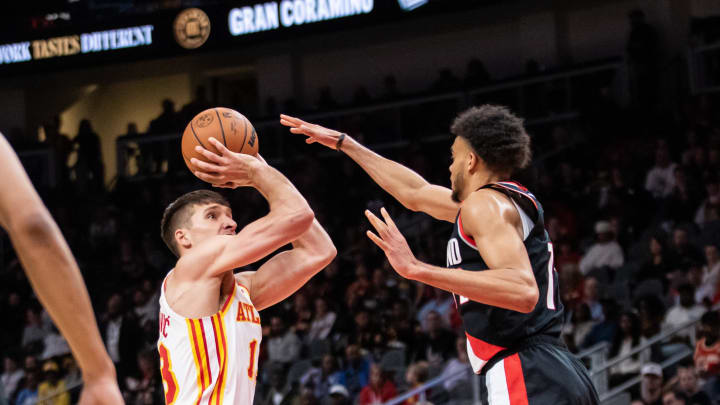Mar 27, 2024; Atlanta, Georgia, USA; Atlanta Hawks guard Bogdan Bogdanovic (13) shoots against