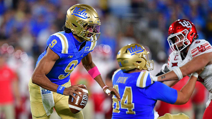 Aug 30, 2025; Pasadena, California, USA; UCLA Bruins quarterback Nico Iamaleava (9) runs the ball as offensive lineman Sam Yoon (64) provides coverage against Utah Utes linebacker Lander Barton (8) during the second half at Rose Bowl. Mandatory Credit: Gary A. Vasquez-Imagn Images Aug 30, 2025; Pasadena, California, USA; UCLA Bruins quarterback Nico Iamaleava (9) runs the ball as offensive lineman Sam Yoon (64) provides coverage against Utah Utes linebacker Lander Barton (8) during the second half at Rose Bowl. Mandatory Credit: Gary A. Vasquez-Imagn Images