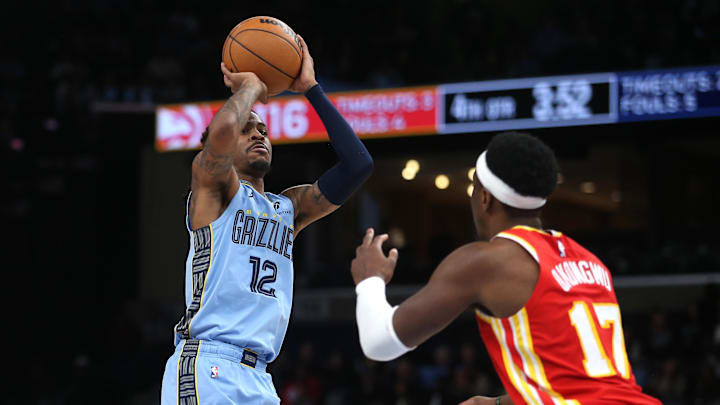 Jan 21, 2026; Memphis, Tennessee, USA; Memphis Grizzlies guard Ja Morant (12) shoots during the fourth quarter against the Atlanta Hawks at FedExForum. Mandatory Credit: Petre Thomas-Imagn Images