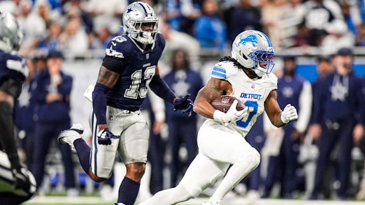 Detroit Lions running back Jahmyr Gibbs (0) runs against Dallas Cowboys during the first half at Ford Field in Detroit on Thursday, Dec. 4, 2025. Detroit Lions running back Jahmyr Gibbs (0) runs against Dallas Cowboys during the first half at Ford Field in Detroit on Thursday, Dec. 4, 2025.