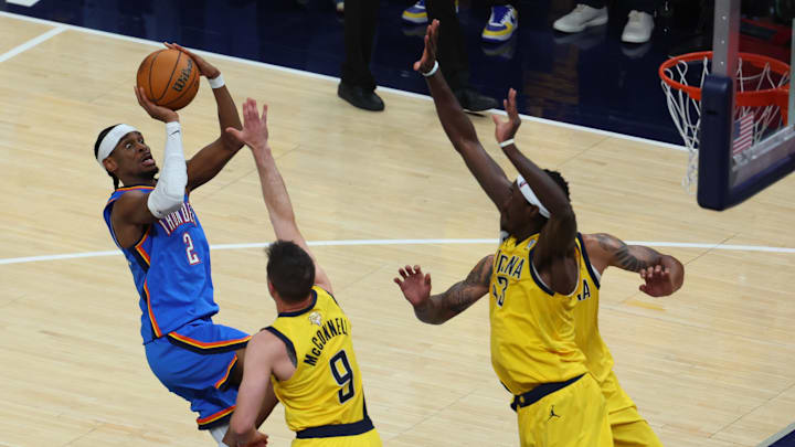 Jun 13, 2025; Indianapolis, Indiana, USA; Oklahoma City Thunder guard Shai Gilgeous-Alexander (2) drives to the hoop past Indiana Pacers guard T.J. McConnell (9) during the third quarter of game four of the 2025 NBA Finals at Gainbridge Fieldhouse. Mandatory Credit: Trevor Ruszkowski-Imagn Images Jun 13, 2025; Indianapolis, Indiana, USA; Oklahoma City Thunder guard Shai Gilgeous-Alexander (2) drives to the hoop past Indiana Pacers guard T.J. McConnell (9) during the third quarter of game four of the 2025 NBA Finals at Gainbridge Fieldhouse. Mandatory Credit: Trevor Ruszkowski-Imagn Images