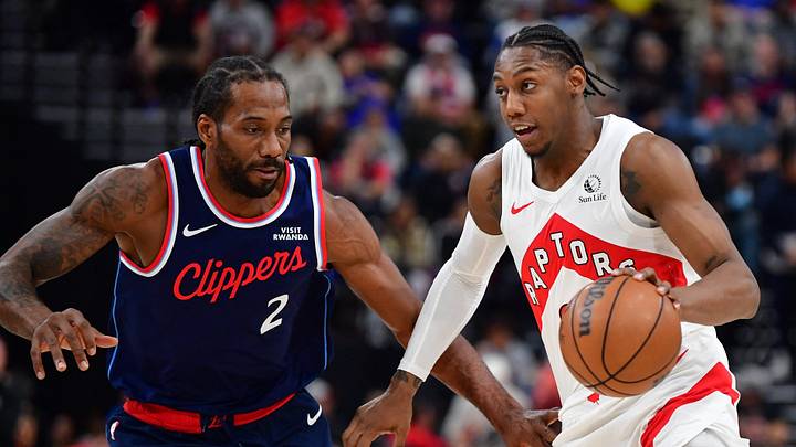Mar 25, 2026; Inglewood, California, USA;  Toronto Raptors forward RJ Barrett (9) moves the ball against Los Angeles Clippers forward Kawhi Leonard (2) during the first half at Intuit Dome. Mandatory Credit: Gary A. Vasquez-Imagn Images