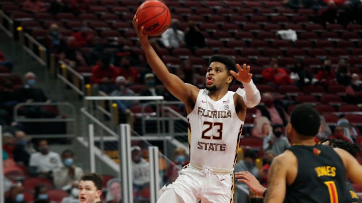 Florida State's MJ Walker lets a shot go over Louisville.01/18/21

Louisville Floridastate 09