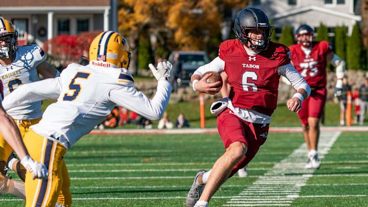 Quarterback Peter Bourque runs the ball.