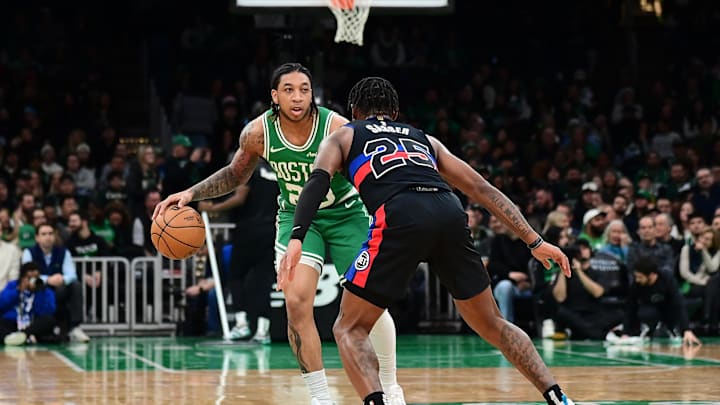 Dec 12, 2024; Boston, Massachusetts, USA; Boston Celtics guard JD Davison (20) dribbles against Detroit Pistons guard Marcus Sasser (25) during the second half at TD Garden. Mandatory Credit: Eric Canha-Imagn Images Dec 12, 2024; Boston, Massachusetts, USA; Boston Celtics guard JD Davison (20) dribbles against Detroit Pistons guard Marcus Sasser (25) during the second half at TD Garden. Mandatory Credit: Eric Canha-Imagn Images