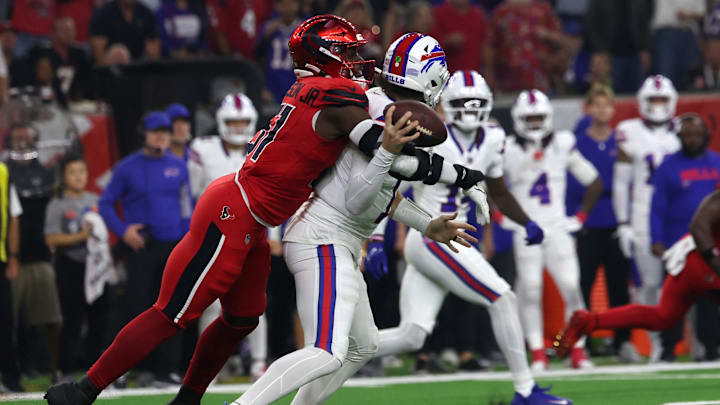 Houston Texans defensive end Will Anderson Jr. (51) sacks Buffalo Bills quarterback Josh Allen (17) in the first half at NRG Stadium.