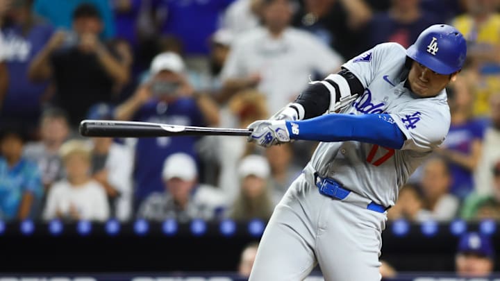 Sep 19, 2024; Miami, Florida, USA; Los Angeles Dodgers designated hitter Shohei Ohtani (17) hits a two-run home run against the Miami Marlins during the seventh inning at loanDepot Park. Mandatory Credit: Sam Navarro-Imagn Images