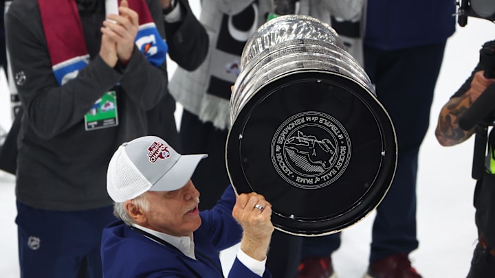 Jun 26, 2022; Tampa, Florida, USA; Colorado Avalanche owner Stan Kroenke celebrates with the Stanley Cup trophy after defeating the Tampa Bay Lightning during game six of the 2022 Stanley Cup Final at Amalie Arena. Mandatory Credit: Mark J. Rebilas-Imagn Images