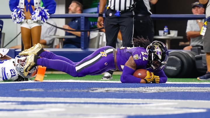 Sep 22, 2024; Arlington, Texas, USA; Baltimore Ravens running back Derrick Henry (22) scores a touchdown during the third quarter against the Dallas Cowboys at AT&T Stadium. 