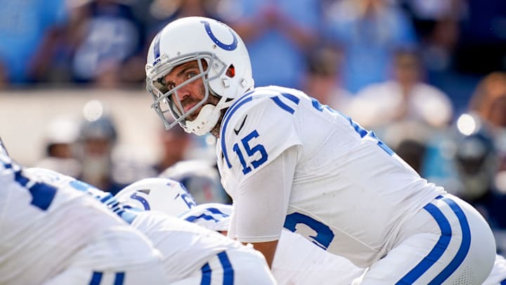Indianapolis Colts quarterback Joe Flacco (15) gets in position against the Tennessee Titans during the fourth quarter at Nissan Stadium in Nashville, Tenn., Sunday, Oct. 13, 2024.