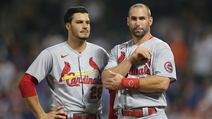 Sep 14, 2021; New York City, New York, USA; St. Louis Cardinals third baseman Nolan Arenado (28) talks to first baseman Paul Goldschmidt (46) after being stranded on the bases against the New York Mets in the top of the tenth inning at Citi Field. Mandatory Credit: Brad Penner-Imagn Images Sep 14, 2021; New York City, New York, USA; St. Louis Cardinals third baseman Nolan Arenado (28) talks to first baseman Paul Goldschmidt (46) after being stranded on the bases against the New York Mets in the top of the tenth inning at Citi Field. Mandatory Credit: Brad Penner-Imagn Images