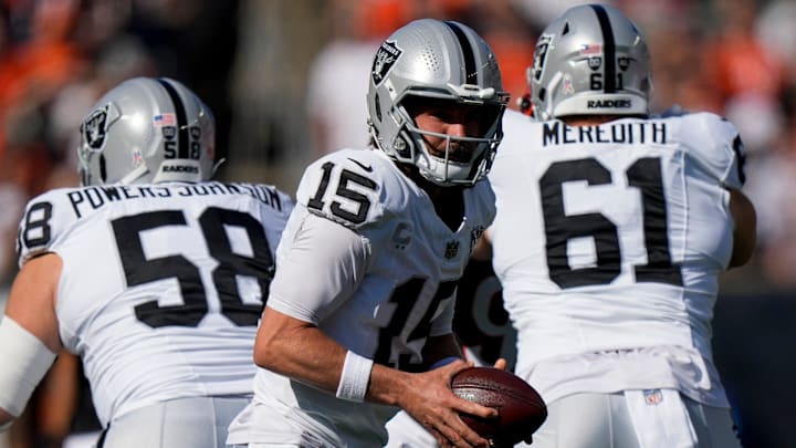 Las Vegas Raiders quarterback Gardner Minshew (15) drops back to hand off in the first quarter of the NFL Week 9 game between the Cincinnati Bengals and the Las Vegas Raiders at Paycor Stadium in downtown Cincinnati on Sunday, Nov. 3, 2024. Las Vegas Raiders quarterback Gardner Minshew (15) drops back to hand off in the first quarter of the NFL Week 9 game between the Cincinnati Bengals and the Las Vegas Raiders at Paycor Stadium in downtown Cincinnati on Sunday, Nov. 3, 2024.