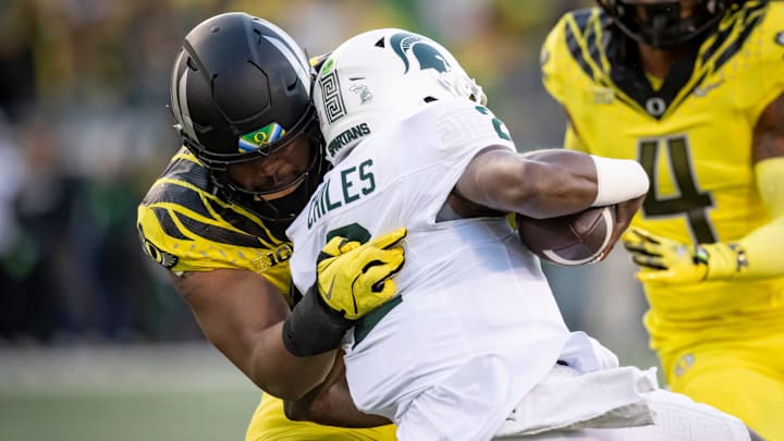 Oregon Ducks defensive lineman Derrick Harmon sacks Michigan State Spartans quarterback Aidan Chiles as the Ducks host the Spartans Friday, Oct. 4, 2024 at Autzen Stadium in Eugene, Ore.