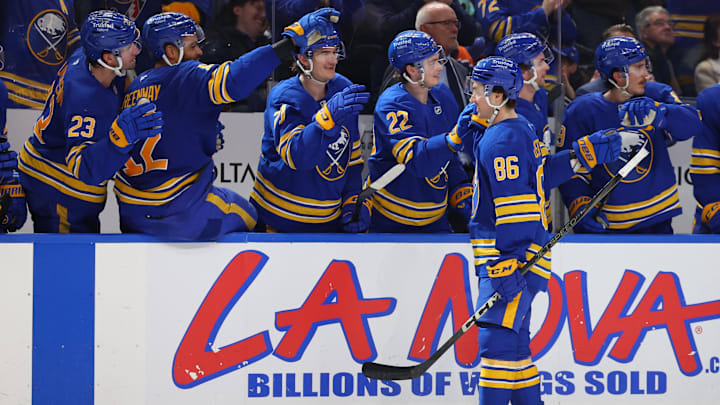 Noah Ostlund celebrates with fellow Buffalo Sabres players Noah Ostlund celebrates with fellow Buffalo Sabres players