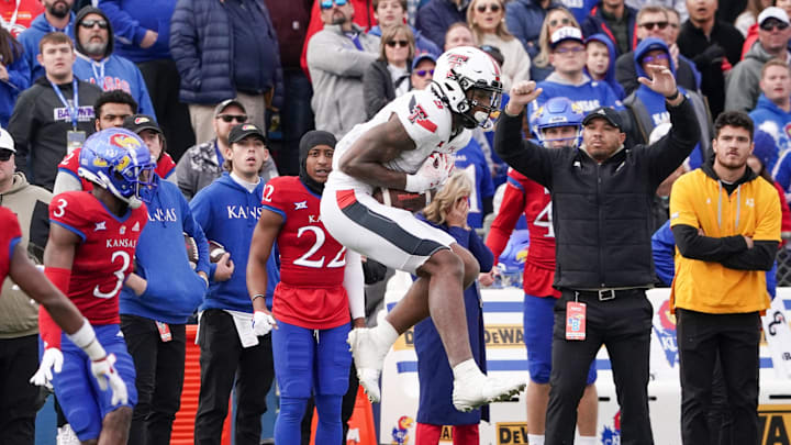 Nov 11, 2023; Lawrence, Kansas, USA; Texas Tech Red Raiders wide receiver Jerand Bradley (9) catches a pass against the Kansas Jayhawks during the second half at David Booth Kansas Memorial Stadium. Mandatory Credit: Denny Medley-Imagn Images