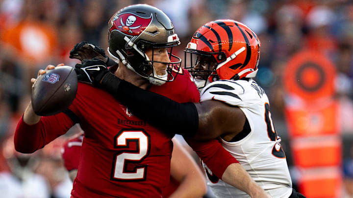 Cincinnati Bengals defensive end Myles Murphy (99) hits Tampa Bay Buccaneers quarterback Kyle Trask (2) causing an incomplete pass in the second quarter of the NFL preseason game at Paycor Stadium in Cincinnati on Saturday, August 10, 2024.
