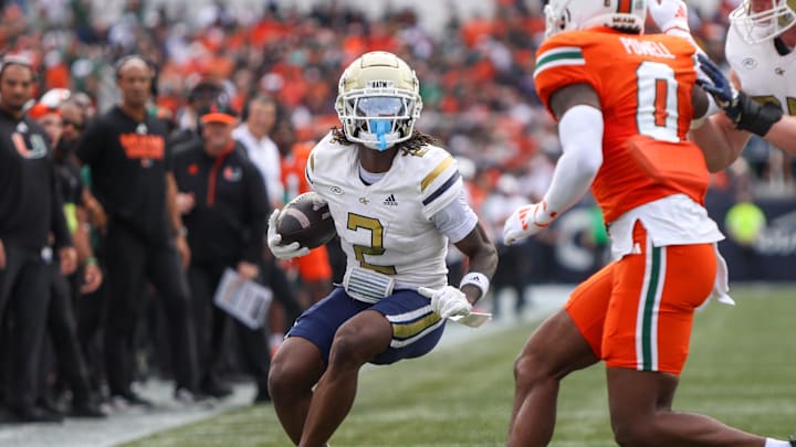 Nov 9, 2024; Atlanta, Georgia, USA; Georgia Tech Yellow Jackets wide receiver Eric Singleton Jr. (2) runs the ball against the Miami Hurricanes in the second quarter at Bobby Dodd Stadium at Hyundai Field. Mandatory Credit: Brett Davis-Imagn Images