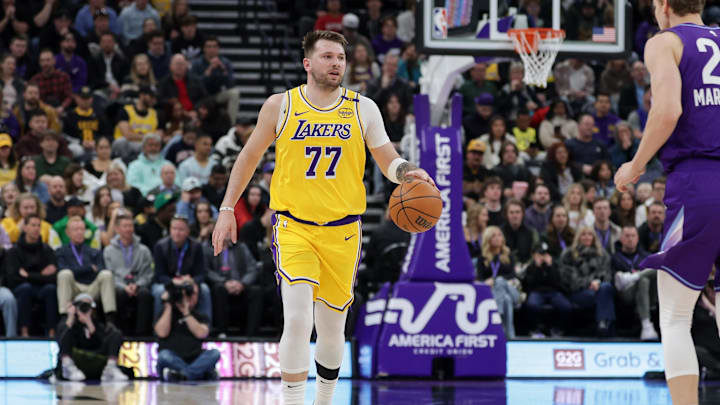 Feb 12, 2025; Salt Lake City, Utah, USA; Los Angeles Lakers guard Luka Doncic (77) dribbles during the first quarter against the Utah Jazz at Delta Center. Mandatory Credit: Chris Nicoll-Imagn Images Feb 12, 2025; Salt Lake City, Utah, USA; Los Angeles Lakers guard Luka Doncic (77) dribbles during the first quarter against the Utah Jazz at Delta Center. Mandatory Credit: Chris Nicoll-Imagn Images