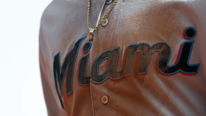 Apr 11, 2019; Cincinnati, OH, USA; A view of the logo on the chest of the jersey of a Miami Marlins player in the game against the Cincinnati Reds at Great American Ball Park. 