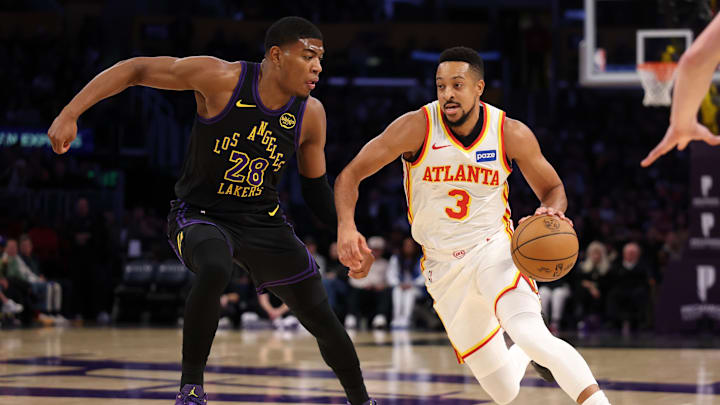 Jan 13, 2026; Los Angeles, California, USA;  Atlanta Hawks guard CJ McCollum (3) drives to the basket against Los Angeles Lakers forward Rui Hachimura (28) during the first half at Crypto.com Arena. Mandatory Credit: Kiyoshi Mio-Imagn Images