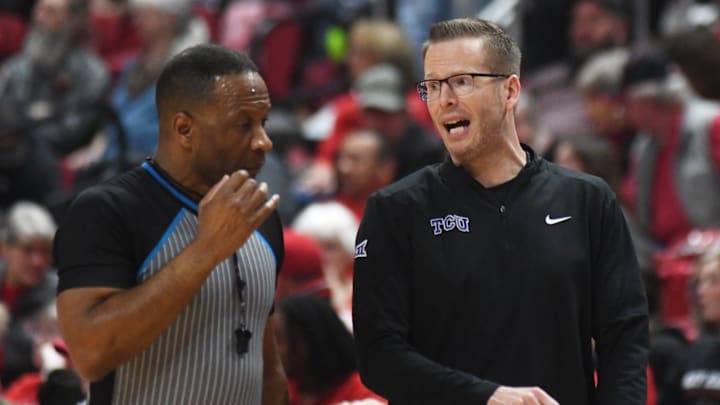 TCU women's basketball coach Mark Campbell talks to an official in a Big 12 game against Texas Tech on Sunday, Feb. 1, 2026, at United Supermarkets Arena.
