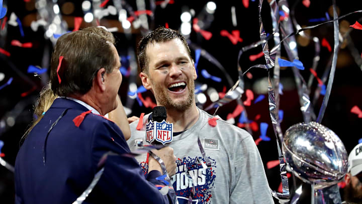 Feb 3, 2019; Atlanta, GA, USA; New England Patriots quarterback Tom Brady (12) is interviewed by CBS announcer Jim Nantz after beating the Los Angeles Rams in Super Bowl LIII at Mercedes-Benz Stadium. Mandatory Credit: Matthew Emmons-Imagn Images