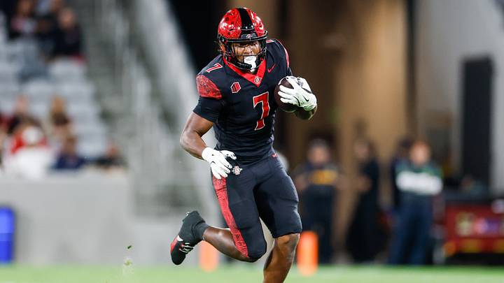 Oct 3, 2025; San Diego, California, USA; San Diego State Aztecs running back Lucky Sutton (7). Oct 3, 2025; San Diego, California, USA; San Diego State Aztecs running back Lucky Sutton (7).