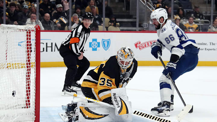 Jan 12, 2025; Pittsburgh, Pennsylvania, USA;  Tampa Bay Lightning right wing Nikita Kucherov (86) scores his second goal of the game against the Pittsburgh Penguins goaltender Tristan Jarry (35) during the third period at PPG Paints Arena. Mandatory Credit: Charles LeClaire-Imagn Images