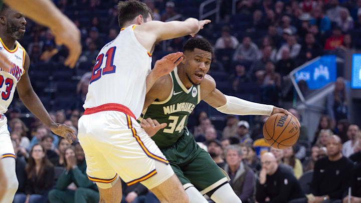 Mar 18, 2025; San Francisco, California, USA; Milwaukee Bucks forward Giannis Antetokounmpo (34) drives around Golden State Warriors center Quinten Post (21) during the first quarter at Chase Center. Mandatory Credit: D. Ross Cameron-Imagn Images Mar 18, 2025; San Francisco, California, USA; Milwaukee Bucks forward Giannis Antetokounmpo (34) drives around Golden State Warriors center Quinten Post (21) during the first quarter at Chase Center. Mandatory Credit: D. Ross Cameron-Imagn Images
