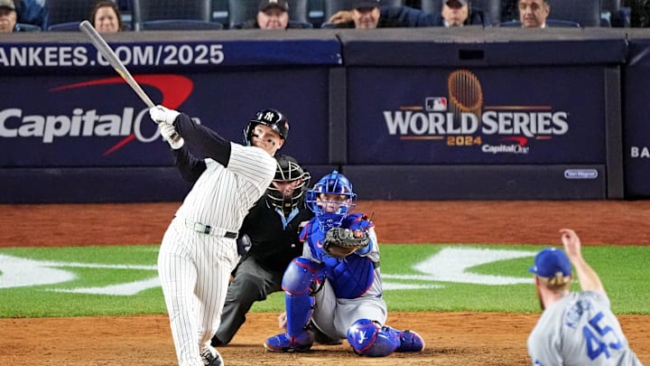 Oct 28, 2024; New York, New York, USA; New York Yankees outfielder Alex Verdugo (24) hits a two run home run during the ninth inning against the Los Angeles Dodgers in game three of the 2024 MLB World Series at Yankee Stadium. Mandatory Credit: Robert Deutsch-Imagn Images