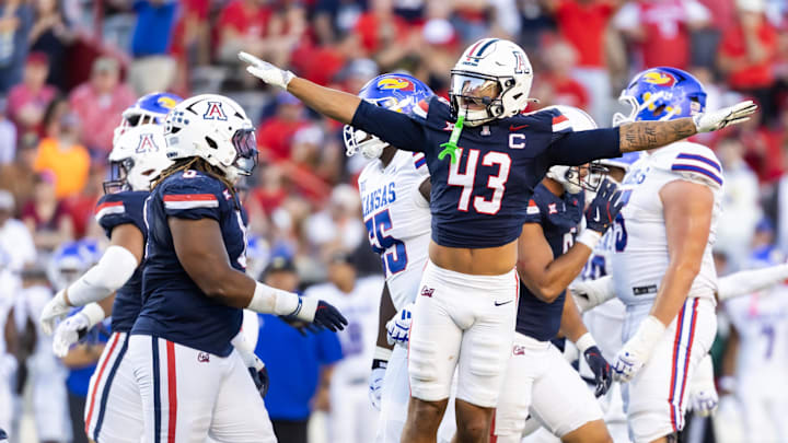 Nov 8, 2025; Tucson, Arizona, USA; Arizona Wildcats defensive back Dalton Johnson (43) celebrates a missed field goal by the Kansas Jayhawks in the second half at Arizona Stadium. Mandatory Credit: Mark J. Rebilas-Imagn Images