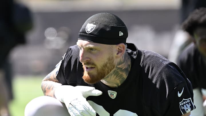 Jun 10, 2025; Henderson, NV, USA; Las Vegas Raiders defensive end Maxx Crosby (98) looks on during the team stretch during Las Vegas Raiders Minicamp at Intermountain Health Performance Center. Mandatory Credit: Candice Ward-Imagn Images