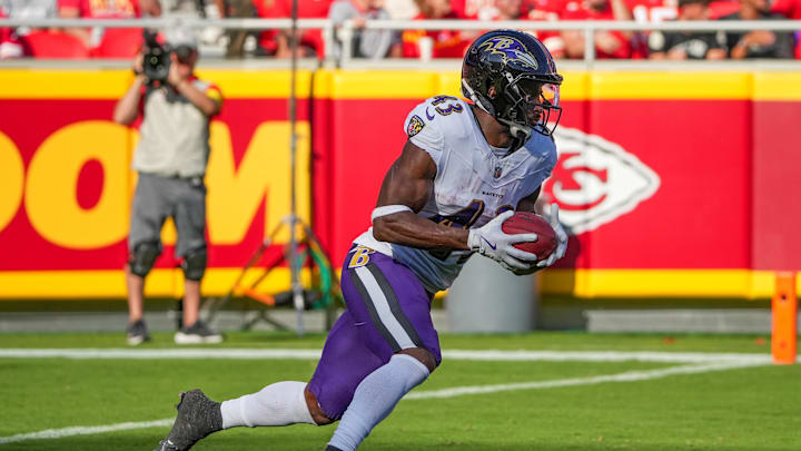 Sep 28, 2025; Kansas City, Missouri, USA; Baltimore Ravens running back Justice Hill (43) returns a kick against the Kansas City Chiefs during the game at GEHA Field at Arrowhead Stadium. Mandatory Credit: Denny Medley-Imagn Images Sep 28, 2025; Kansas City, Missouri, USA; Baltimore Ravens running back Justice Hill (43) returns a kick against the Kansas City Chiefs during the game at GEHA Field at Arrowhead Stadium. Mandatory Credit: Denny Medley-Imagn Images