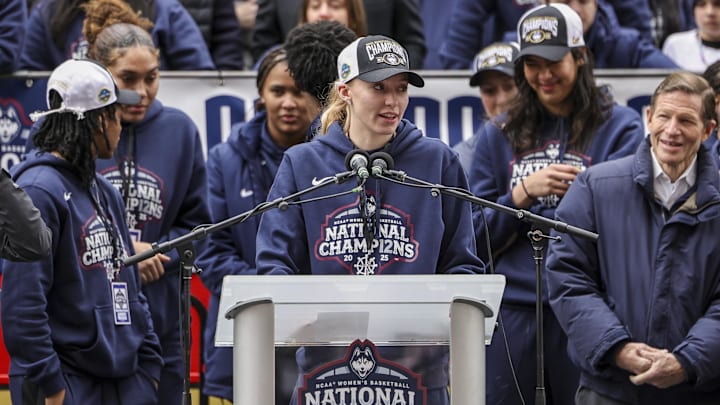 UConn student-athlete Paige Bueckers addresses the crowd during the Final Four champions victory parade.