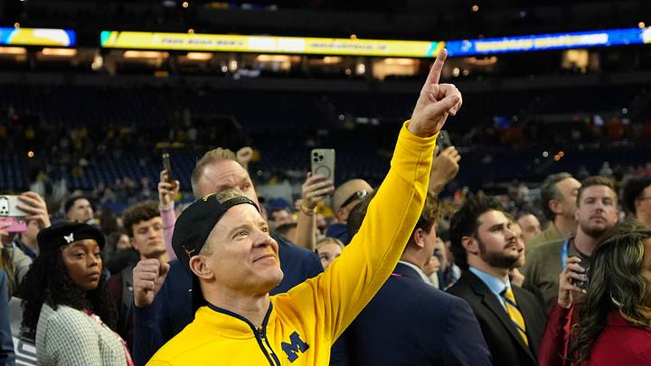 Apr 6, 2026; Indianapolis, IN, USA; Michigan Wolverines head coach Dusty May watches One Shining Moment after the National Championship of the Final Four of the men's 2026 NCAA Tournament at Lucas Oil Stadium. Mandatory Credit: Bob Donnan-Imagn Images