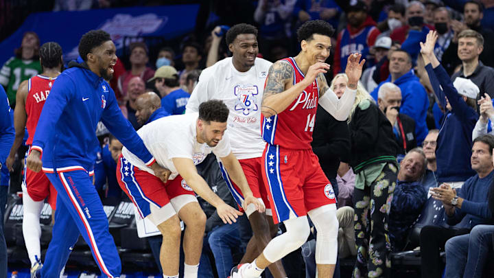 Apr 18, 2022; Philadelphia, Pennsylvania, USA; Philadelphia 76ers forward Danny Green (14) is congratulated by teammates after his dunk against the Toronto Raptors during the fourth quarter in game two of the first round for the 2022 NBA playoffs at Wells Fargo Center. Mandatory Credit: Bill Streicher-Imagn Images Apr 18, 2022; Philadelphia, Pennsylvania, USA; Philadelphia 76ers forward Danny Green (14) is congratulated by teammates after his dunk against the Toronto Raptors during the fourth quarter in game two of the first round for the 2022 NBA playoffs at Wells Fargo Center. Mandatory Credit: Bill Streicher-Imagn Images
