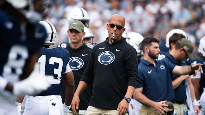 Penn State football coach James Franklin blows his whistle during pre-game warmups before an NCAA football game against Kent State. 