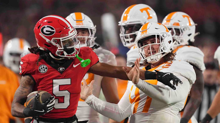 Georgia wide receiver Anthony Evans III (5) interacts with Tennessee long snapper Matthew Salansky (47) during a college football game between Tennessee and Georgia at Sanford Stadium in Athens, Ga., on Saturday, November 16, 2024.
