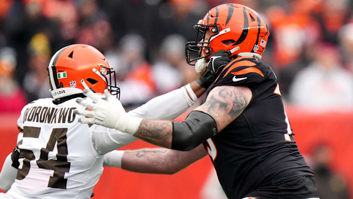 Cincinnati Bengals offensive tackle Jonah Williams (73) blocks Cleveland Browns defensive end Ogbo Okoronkwo (54) in the first quarter during a Week 18 NFL football game between the Cleveland Browns at Cincinnati Bengals, Sunday, Jan. 7, 2024, at Paycor Stadium in Cincinnati.